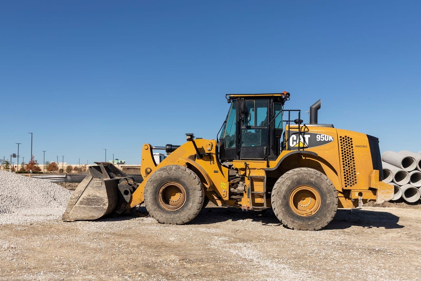 Wheel loader standing in a gravel yard